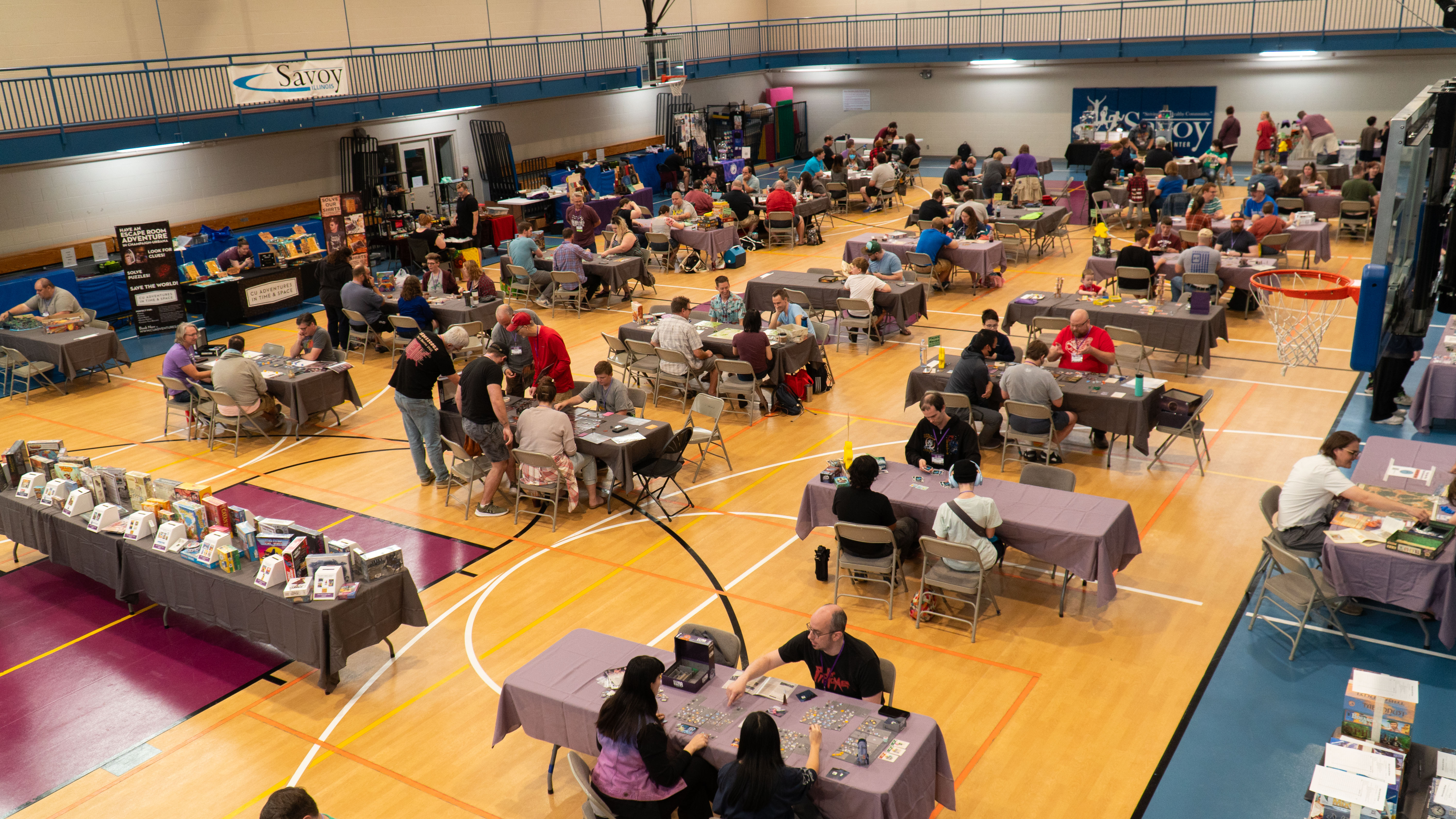 Birds eye view of people playing games at the 2023 convention